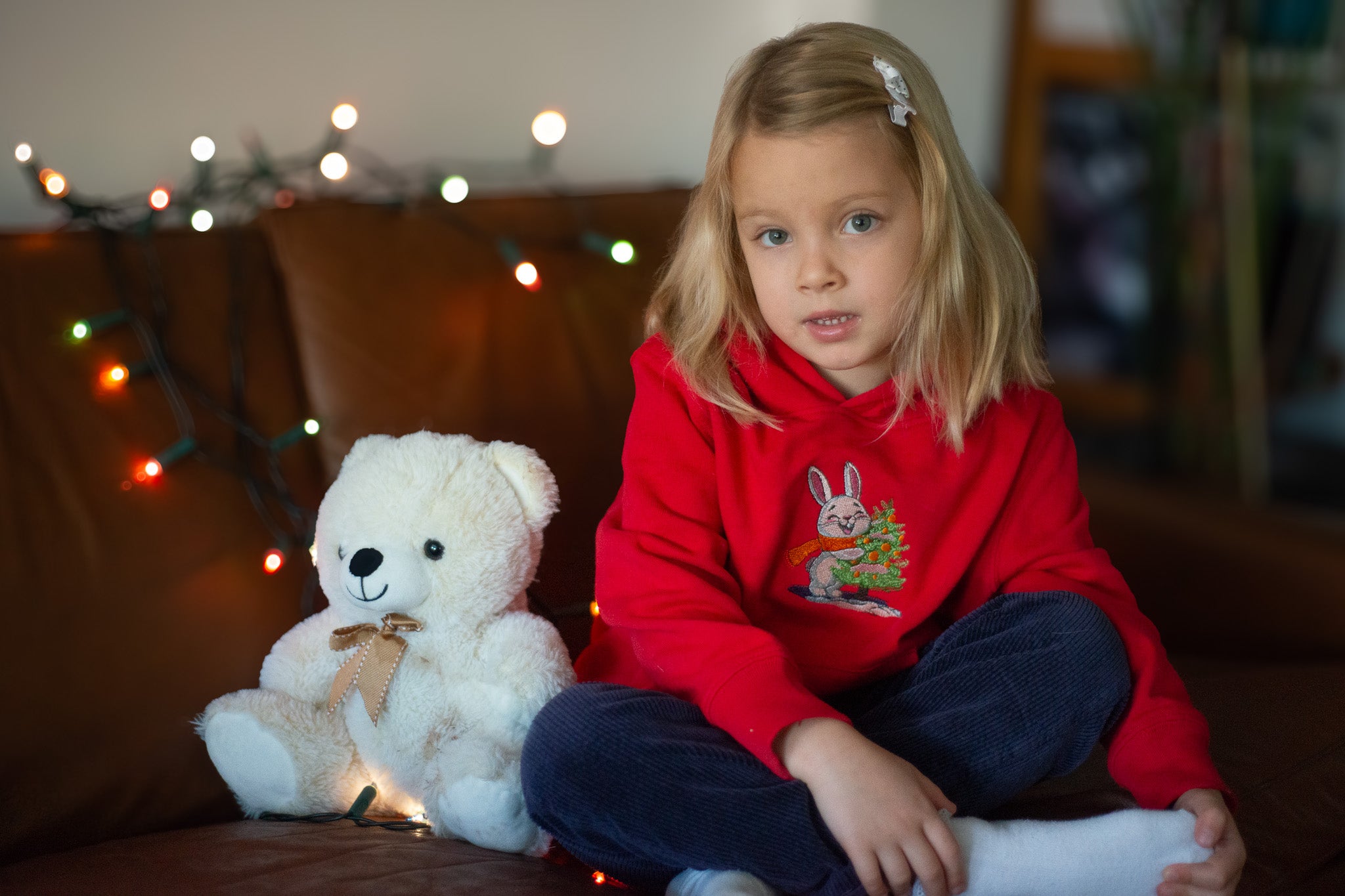 kid wearing cotton christmas jumper with a bunny